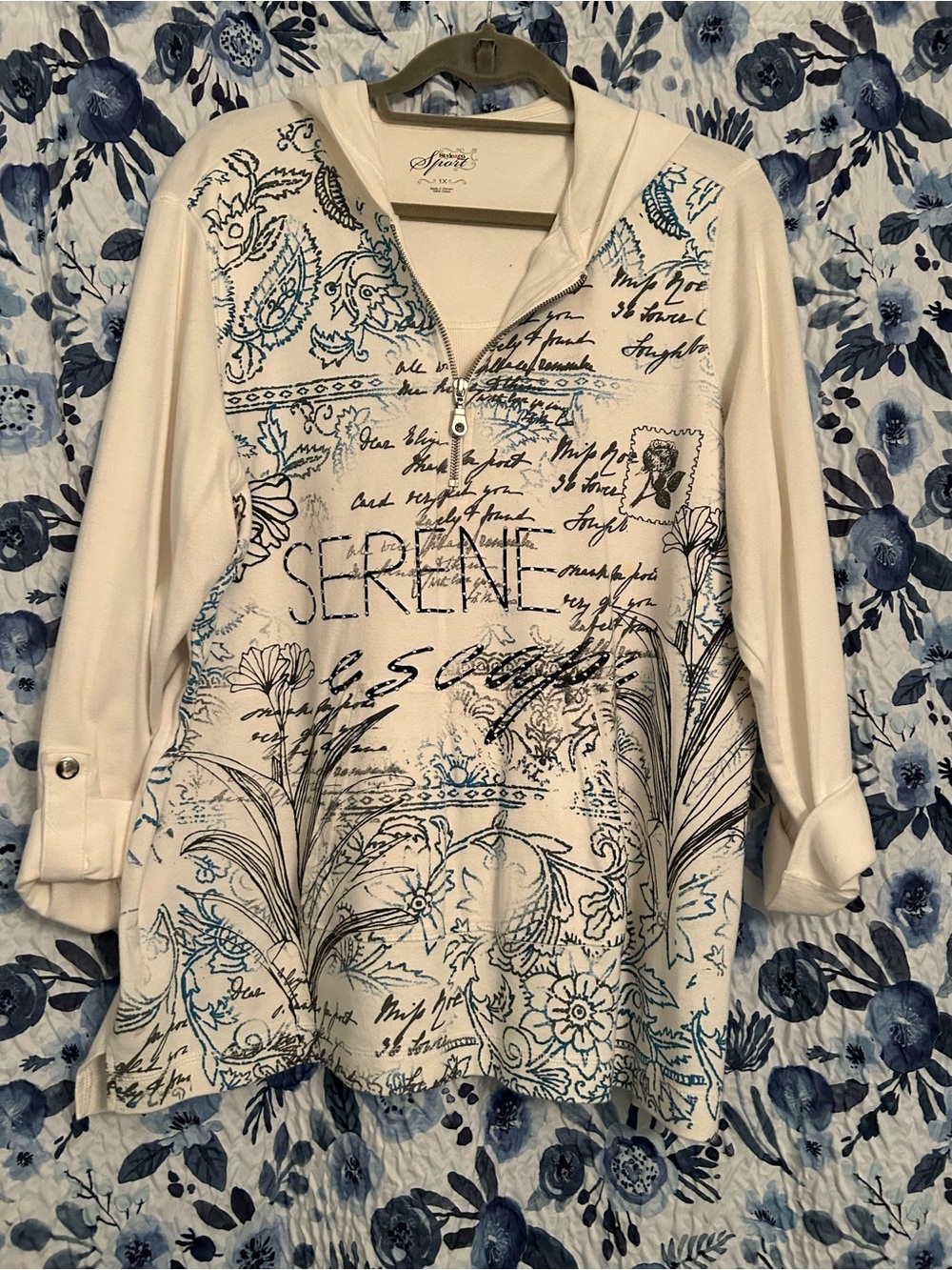 White Zip-Neck Tunic with Blue and Black Script Floral Print.